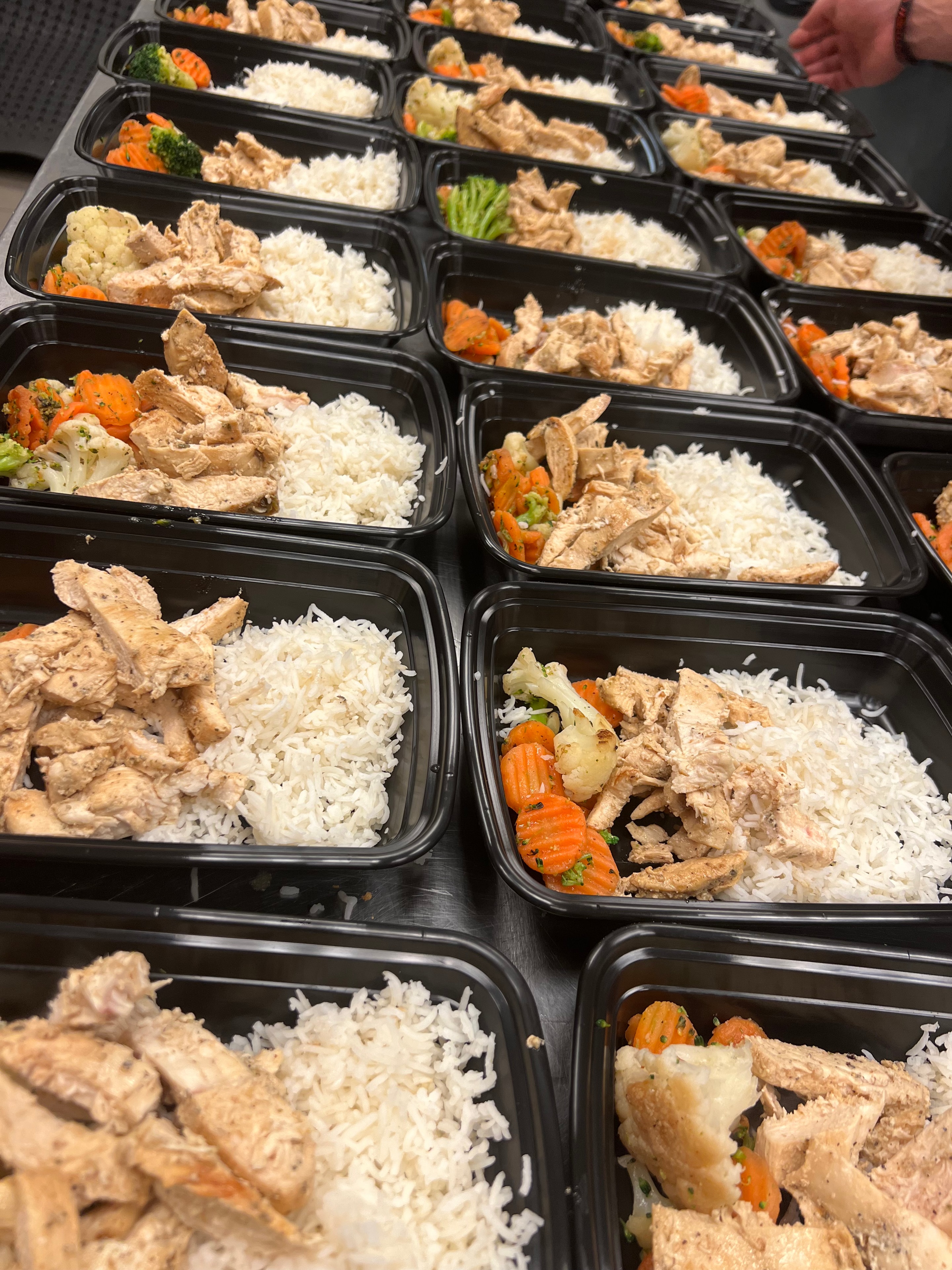 Grilled chicken with rice and vegetables meal prep containers