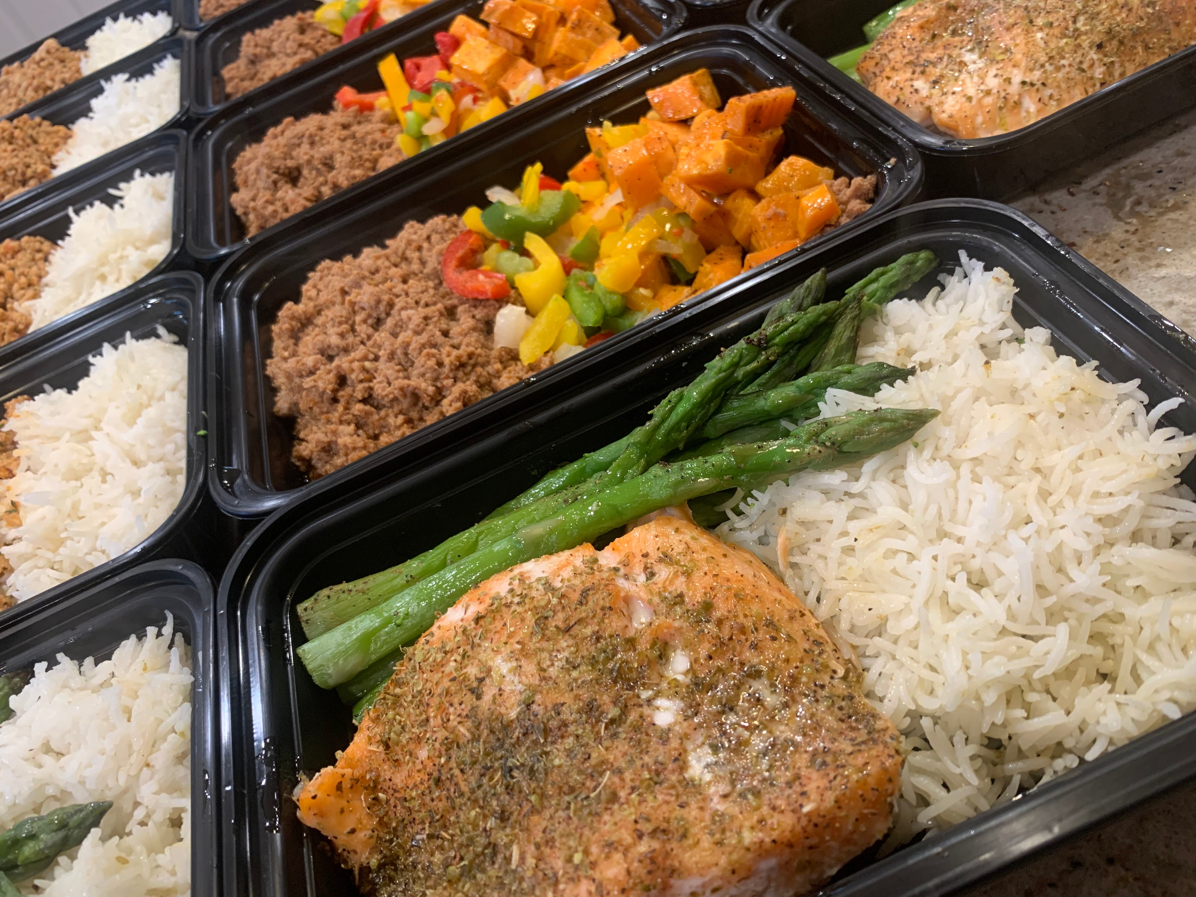 Salmon with asparagus and rice meal prep containers